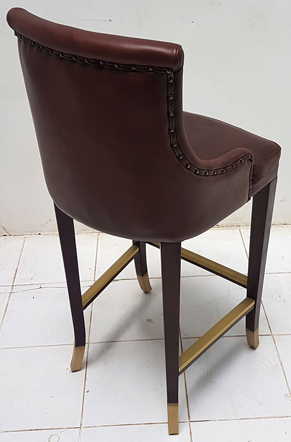 antique leather bar chair with brass foot rest