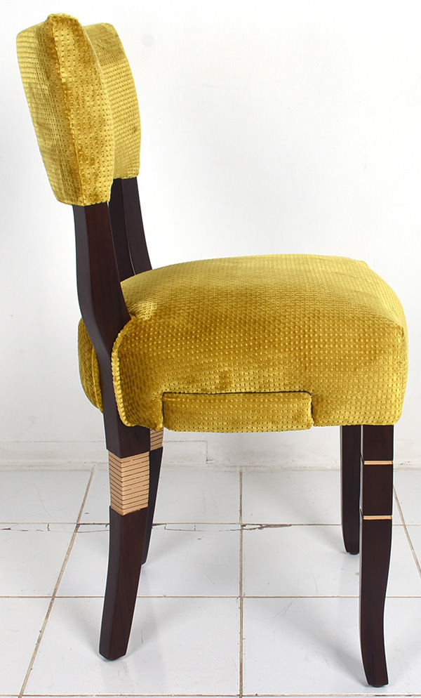 Coya restaurant yellow dining chair