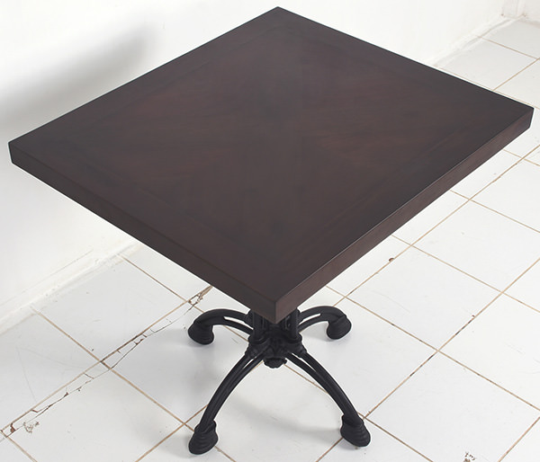 square dining table with cast iron chair