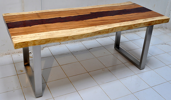 suar dining table with resin and stainless steel legs