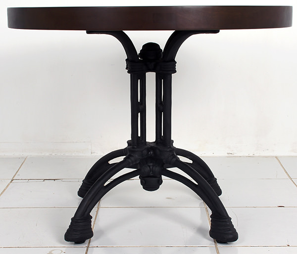 round dining table with cast iron chair