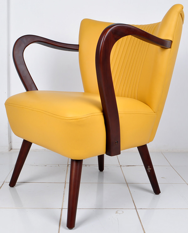 French mid-century design armchair with teak wooden arms and genuine leather upholstery and double stitching