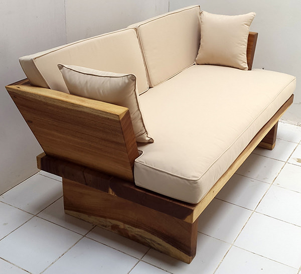 suar wood sofa with white mattress and two throwing pillows