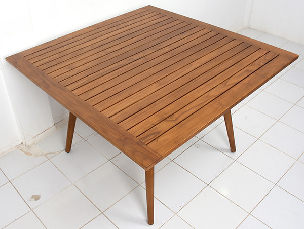 solid teak Scandinavian design restaurant outdoor table with open slats with natural stain