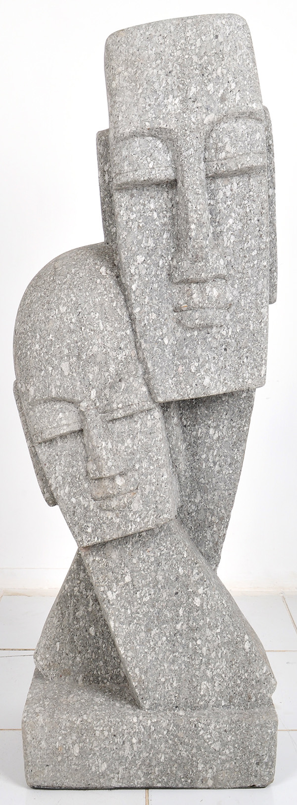 primitive ethnic heads stone sculpture
