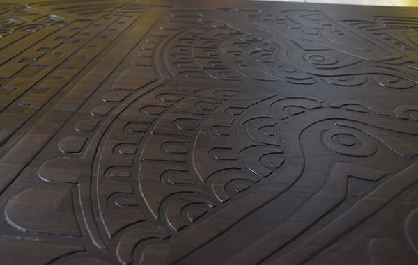 removable table top with Peruvian traditional carvings