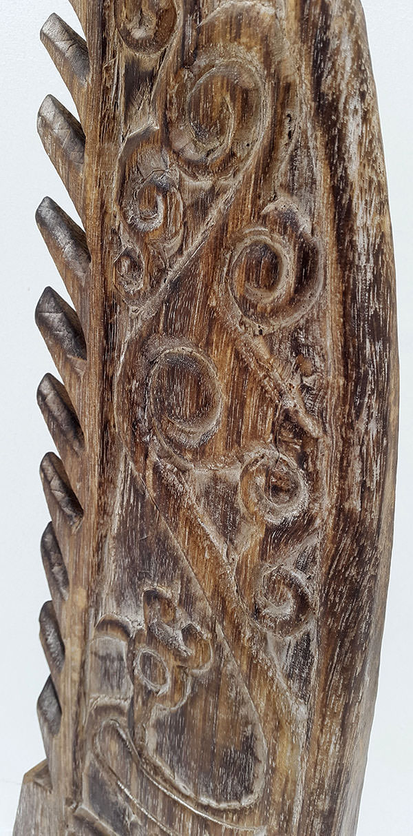 standing ethnic wooden fin