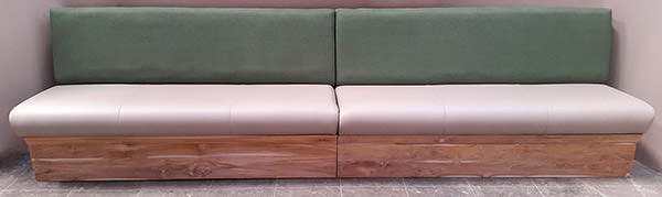 teak, leather and linen L-shaped banquette for restaurant in Miami