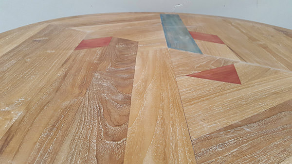 teak laminated table top with colored geometric pattern