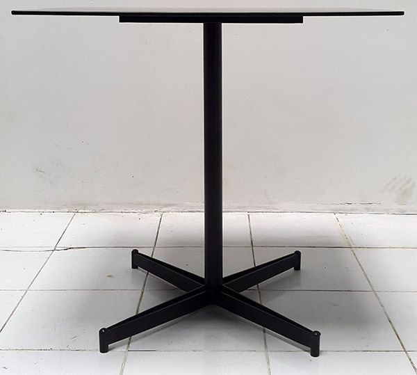square black iron outdoor table with one leg