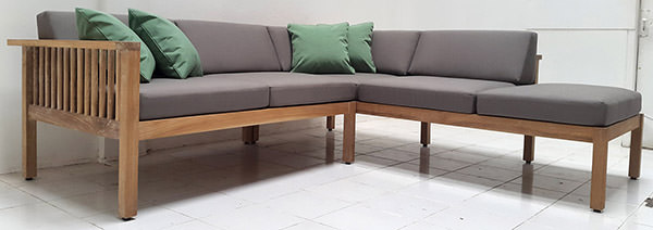 L-shaped teak outdoor sofa with grey linen