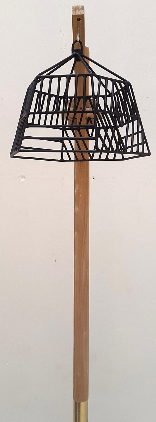 teak and iron standing lamp for restaurant