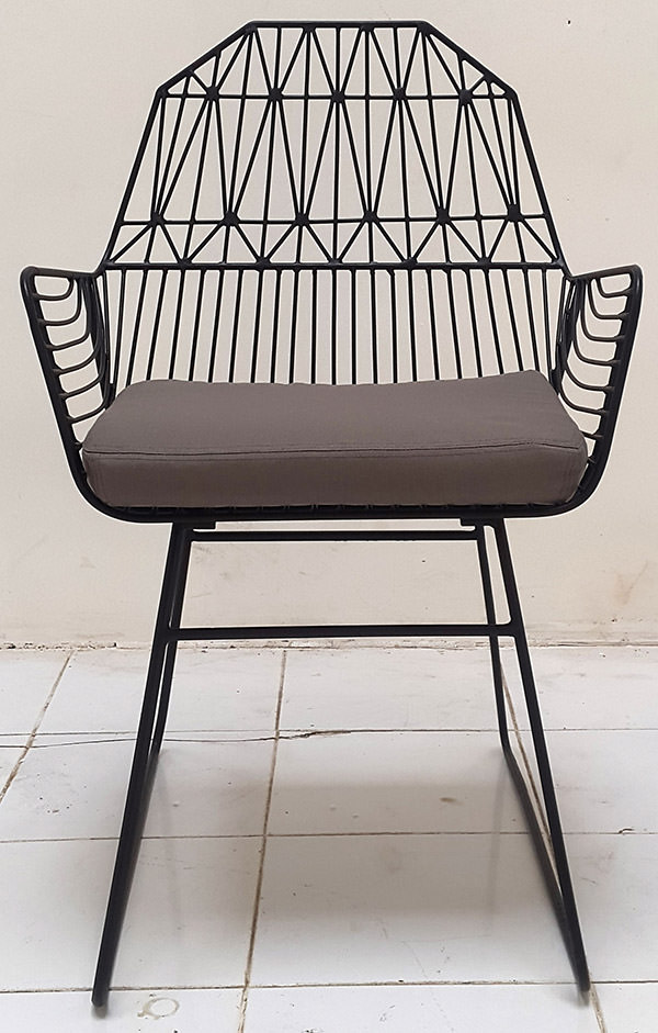 outdoor iron armchair with welded geometric pattern
