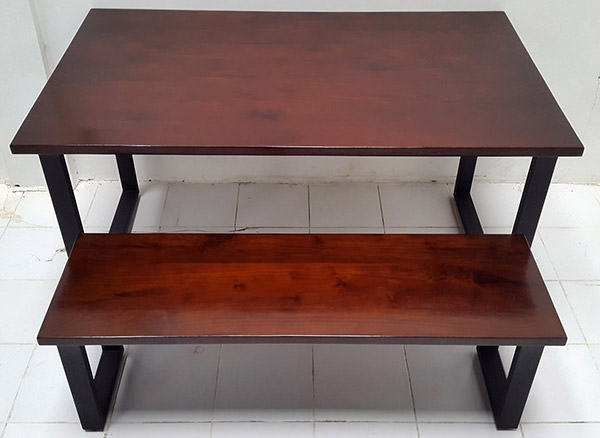 wood and iron table and bench set